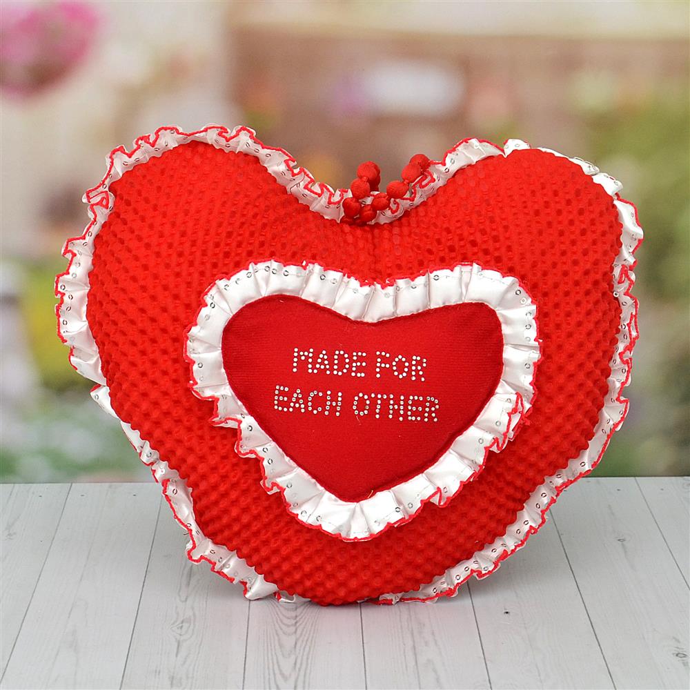 red heart shaped cushion